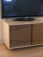 apple ply media cabinet with walnut doors and feet